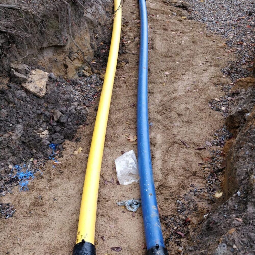 Underground water and gas mains in progress.