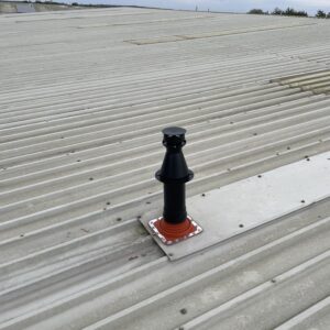 A flute terminal installed on an industrial roof.