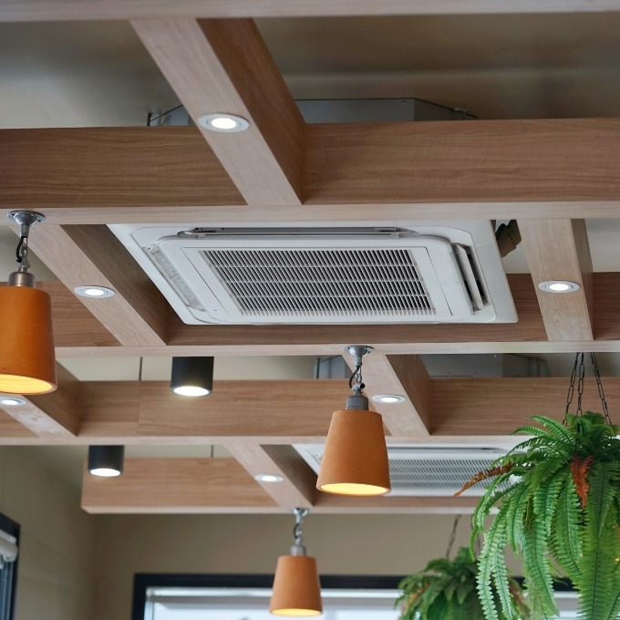 Split panel air conditioning on ceiling